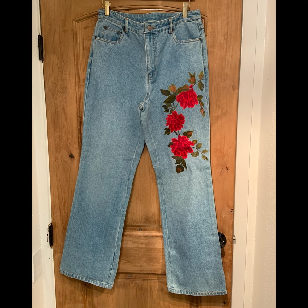 Beautiful red embroidered floral jeans.